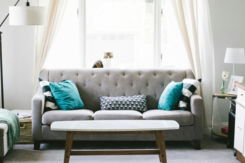 brown-and-white-wooden-table-beside-sofa-chair.jpg brown and white wooden table beside sofa chair